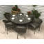 Lilia 6 - Person Wicker Patio Dining Set with Round Table , Cushions Included
