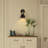 1- Light Black/ Brass Armed Wall Sconce