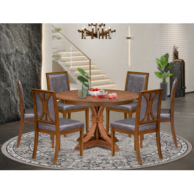 L'ensemble de table de cuisine 7 pièces comprend une table de salle à manger ronde et 6 chaises en similicuir gris foncé avec dossier élégant, finition noyer antique.