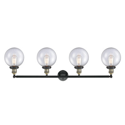 Éclairage pour meuble-lavabo en laiton antique à 4 lumières Lorri