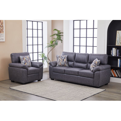 Ensemble de meubles de salon moderne en similicuir deux pièces avec canapé et fauteuil avec coussins moelleux et coussins décoratifs