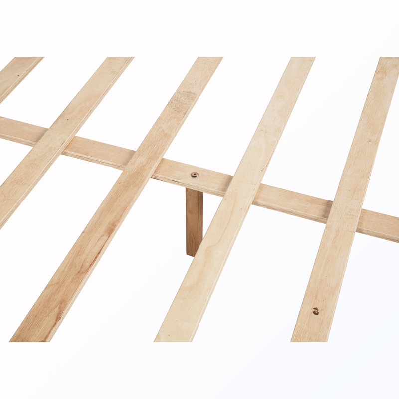 Grand lit en bois avec tête de lit tapissier