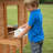 Backyard Discovery Aspen Cedar Wooden Kids Playhouse with Play Kitchen, Snack Bar Window, and Picnic Bench