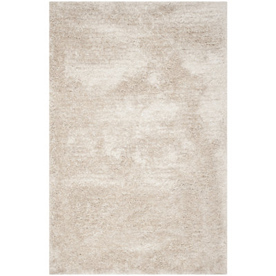 Delane Handmade Shag Champagne Area Rug