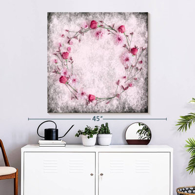 Couronne de fleurs roses sur toile
