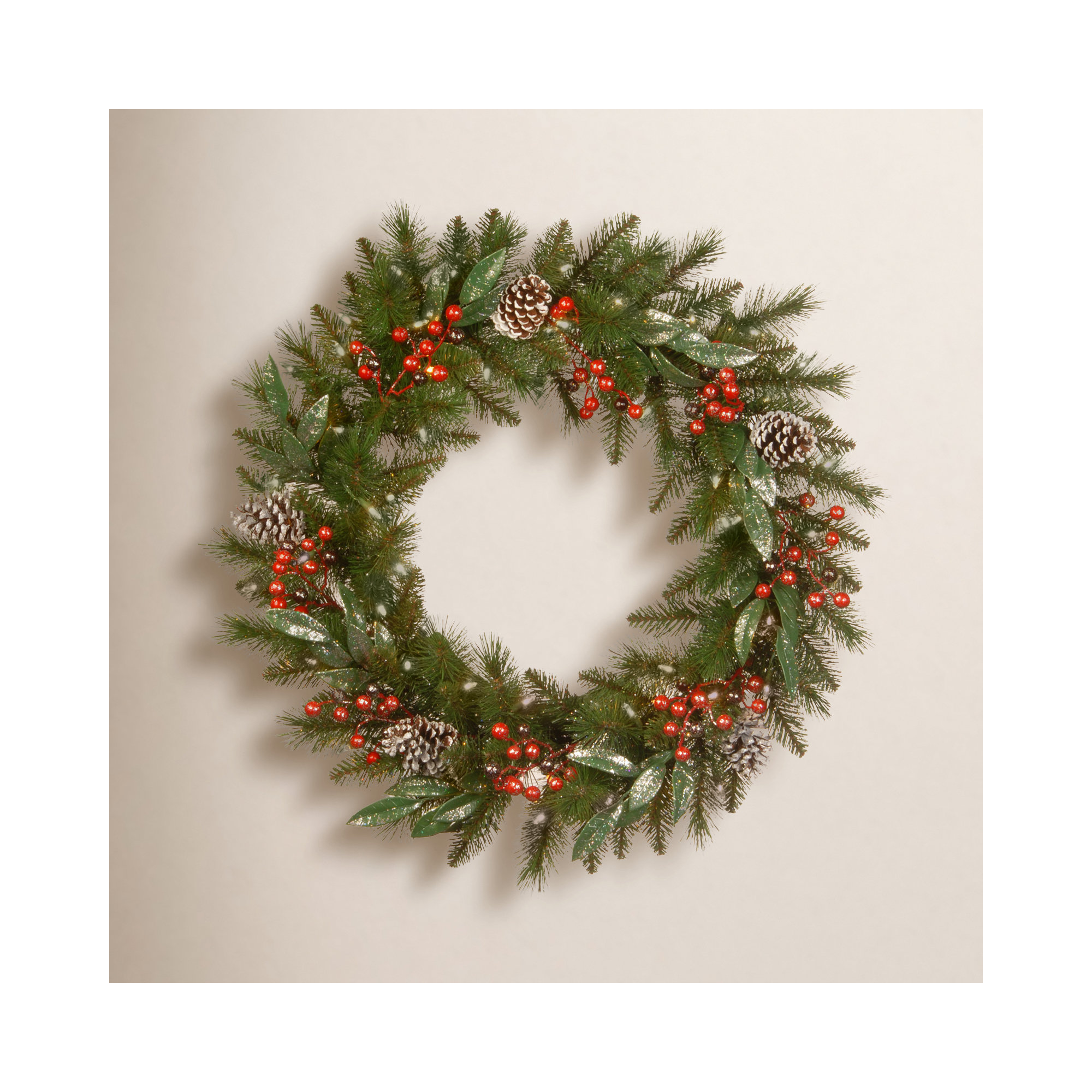 The Holiday Aisle® Frosted Pine Berry Wreath with Battery Operated LED Lights, 24" H x 24" W x 4" D