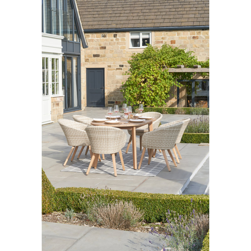 Cambrai 6 - Person Acacia Premium All-Weather Wicker Patio Dining Set with Oval Table