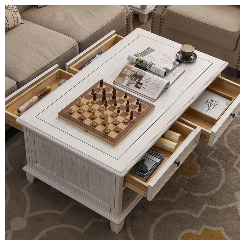Four-drawer coffee table in solid white wood., 20.08" H x 49.21" L x 27.95" W