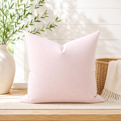 Housse de coussin en coton rose clair