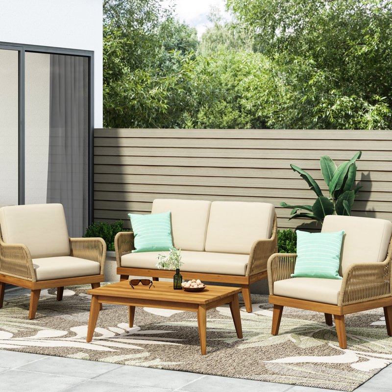 Chat en bois avec beau tissage en corde, coussins d'eau, 2 fauteuils club et table basse