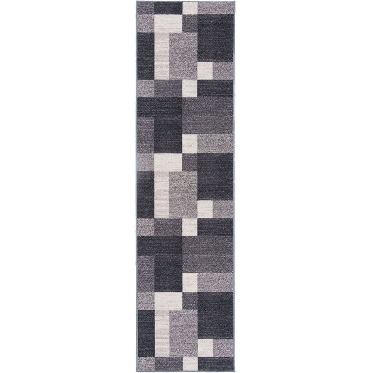 Tapis gris, noir et blanc touffeté à motif géométrique Akieba