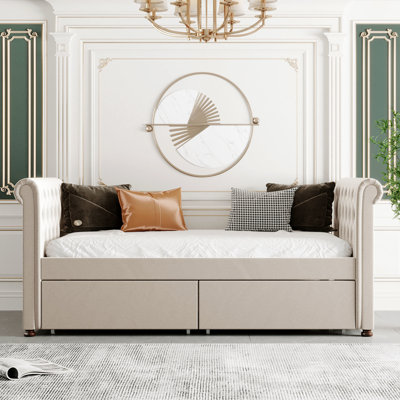Lit de jour simple beige avec rangement, fabrication en bois massif, rehausse les tiroirs fonctionnels de l'ambiance de la chambre à coucher, soutien solide et design élégant