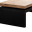 La table basse en bois massif noir et naturel, avec un bureau de salon rustique, ajoute du charme