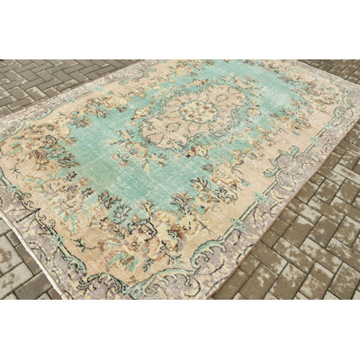 Tapis turc Oushak tissé à la main à motif floral vert pastel pour un décor unique et élégant