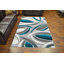 Tapis décoratif turquoise/gris à motif abstrait McCampbell-32514783