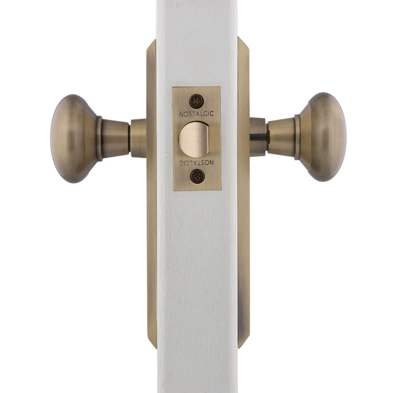 New York Plate with New York Door Knob, Antique Brass, 2-3/8"