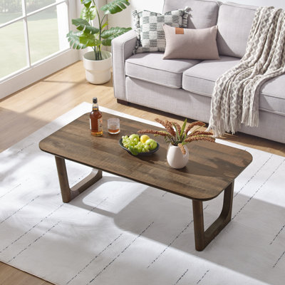 Table basse moderne de 51,4 po de largeur avec pieds uniques en forme de U