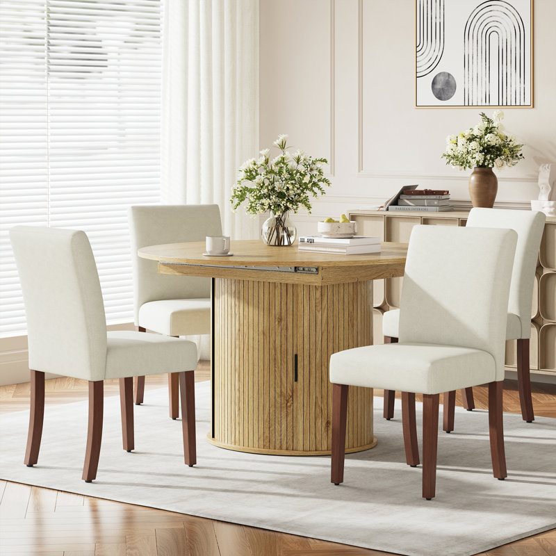 Ensemble de table et de chaises de salle à manger extensibles modernes pour 4 à 8 personnes avec rangement dissimulé, table convertible ronde en ovale et chaises de salle à manger en tissu rembourrées.