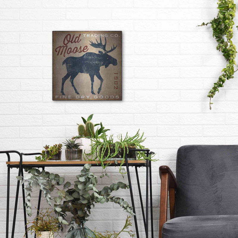 Luxe Moose «Old Moose Trading Co Tan - Dry Goo» «Old Moose Trading Co Tan - Dry Goods» par Ryan Fowler, H 12 po x l 12 po