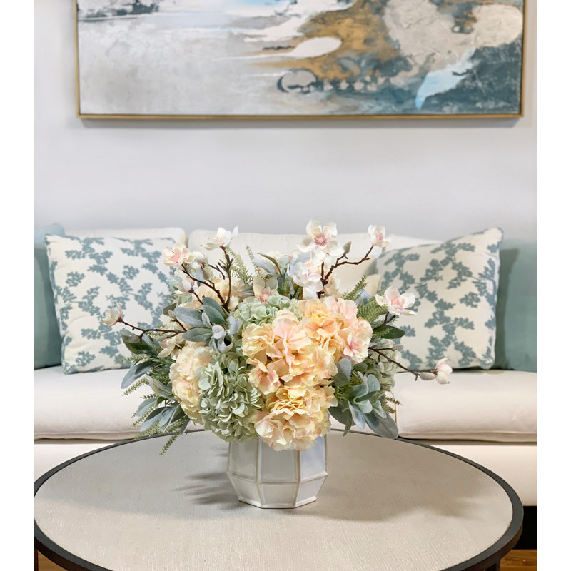 Butterfly Magnolias, Hydrangeas, And Lamb's Ear Arrangement In A Ceramic Vase