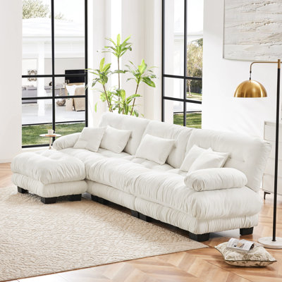 Très grand salon en forme de L - Canapé modulaire à assise profonde de luxe avec chenille blanc