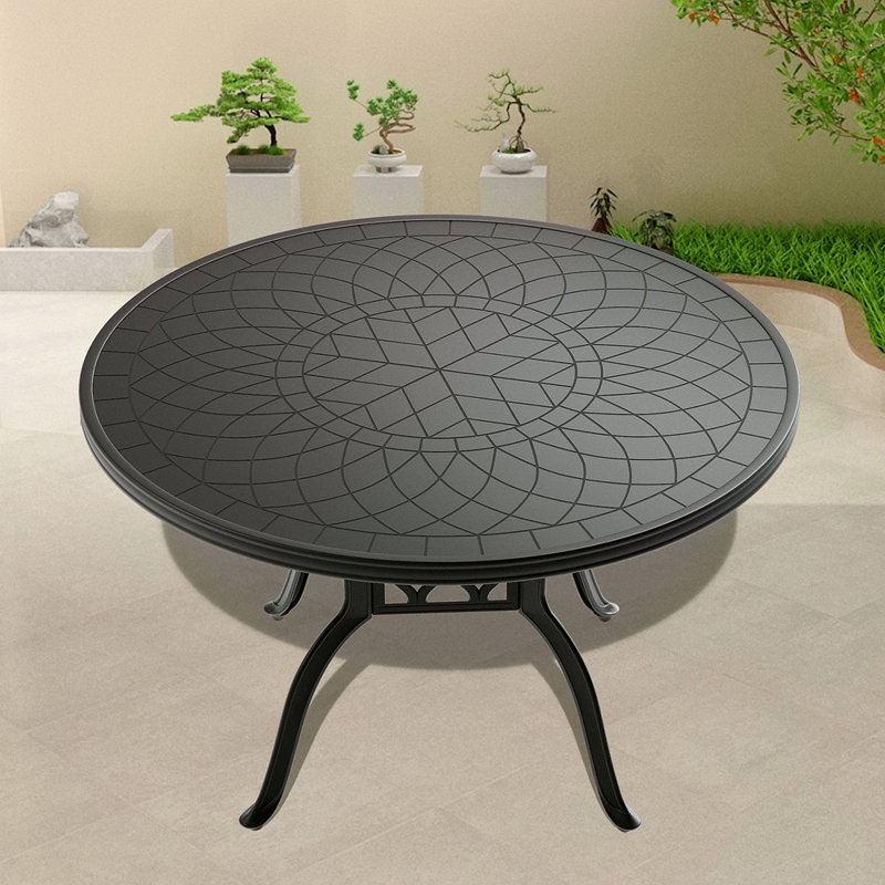 Table de salle à manger 47,24 pouces en fonte d'aluminium avec structure et texture sculptée sur le plateau de table