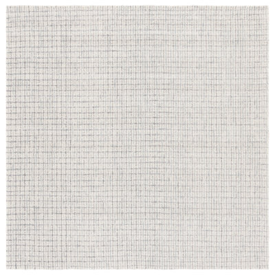 Mireille Ebony Hand Tufted Wool/Cotton Geometric Rug in Light Blue/Ivory