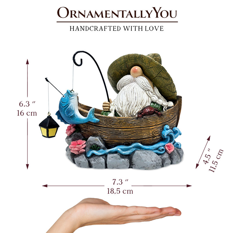 Gnome de pêche avec lanterne