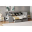 Lit de jour rembourré avec tiroirs, tablettes, armoires rabattables et table d'appoint