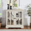 Vitrine élégante, finition blanche, poignée en métal rétro, vitrine à tablettes réglables avec portes, fabrication, tablettes,