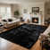 Soft black shag area rug