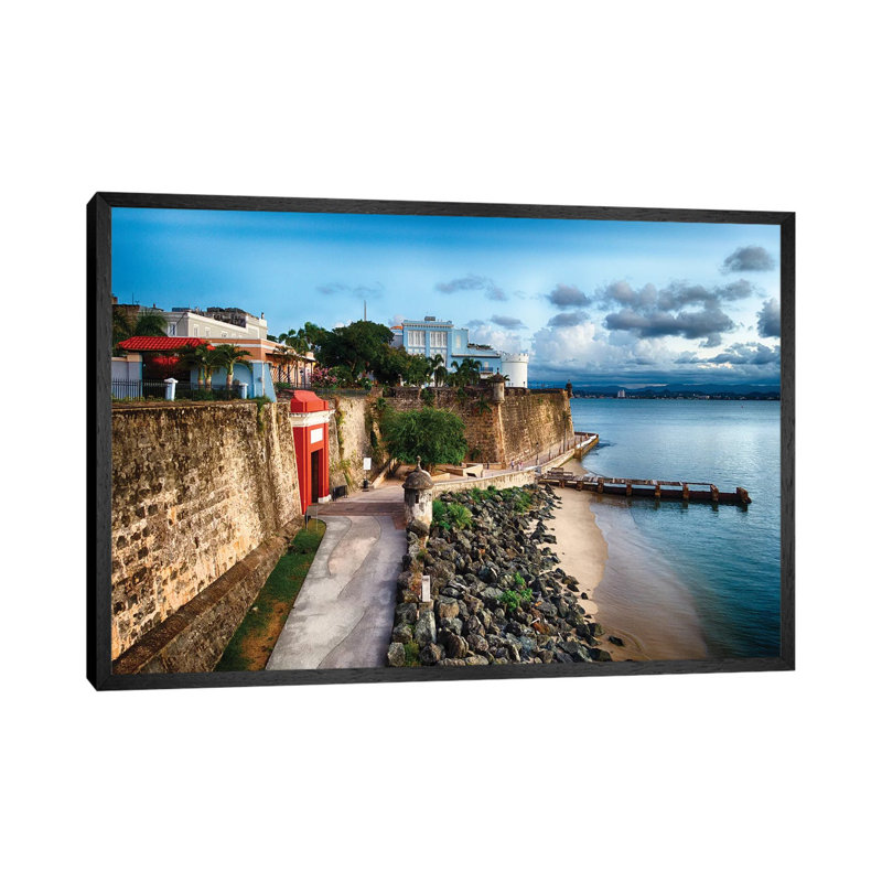 The The City Gate And The La Fortelaza Building In Old San Juan, Puerto Rico by George Oze - Print on Canvas, Black Framed