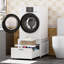 Le socle de laveuse-sécheuse Universal Universal de 29 po comprend un panier à linge intégré, une tablette et un tiroir avec roues, un système anti-vibration, un bac de vidange et un tuyau pour une installation sans effort