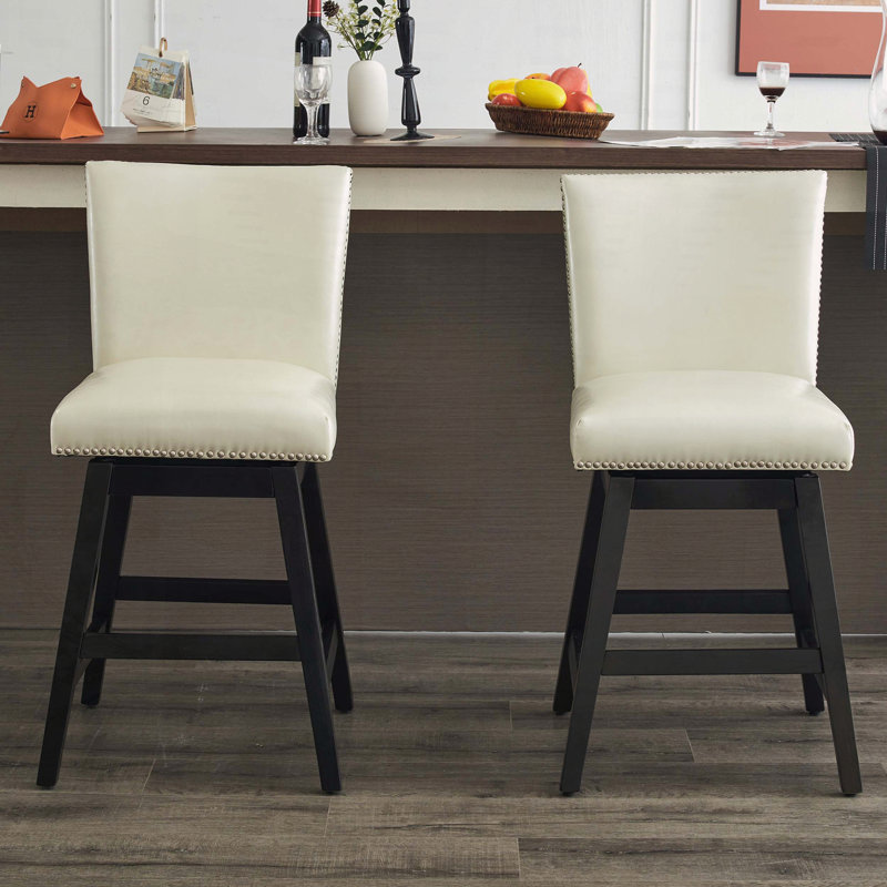 Tabourets de bar rotatifs modernes en cuir synthétique avec garniture cloutée et structure en bois, ensemble de 2