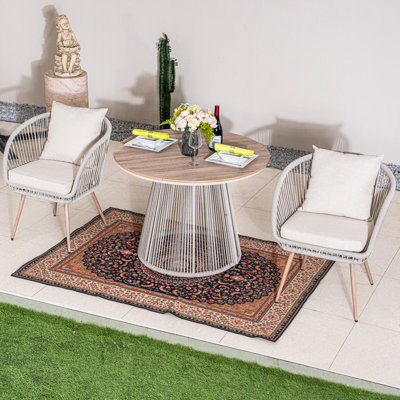 Ensemble repas extérieur pour 4 personnes avec coussins