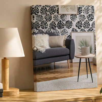 Canvas A Cozy Living Room Scene Featuring A Dark Gray Sofa Wall Art Adorned With Soft Beige Cushions And A Fluffy White Throw Bringing Canvas Wall Art