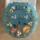 17” toilet seat with sea treasures motif
