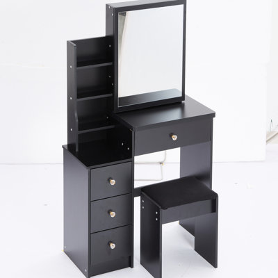 Table de coiffeuse noire avec tabouret rembourré et miroir coulissant, rangement multicouche pour les petits espaces, siège compact de conception ultramoderne, très grand espace de chambre confinée à couches multiples