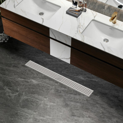 Drain de douche linéaire avec grille de protection amovible