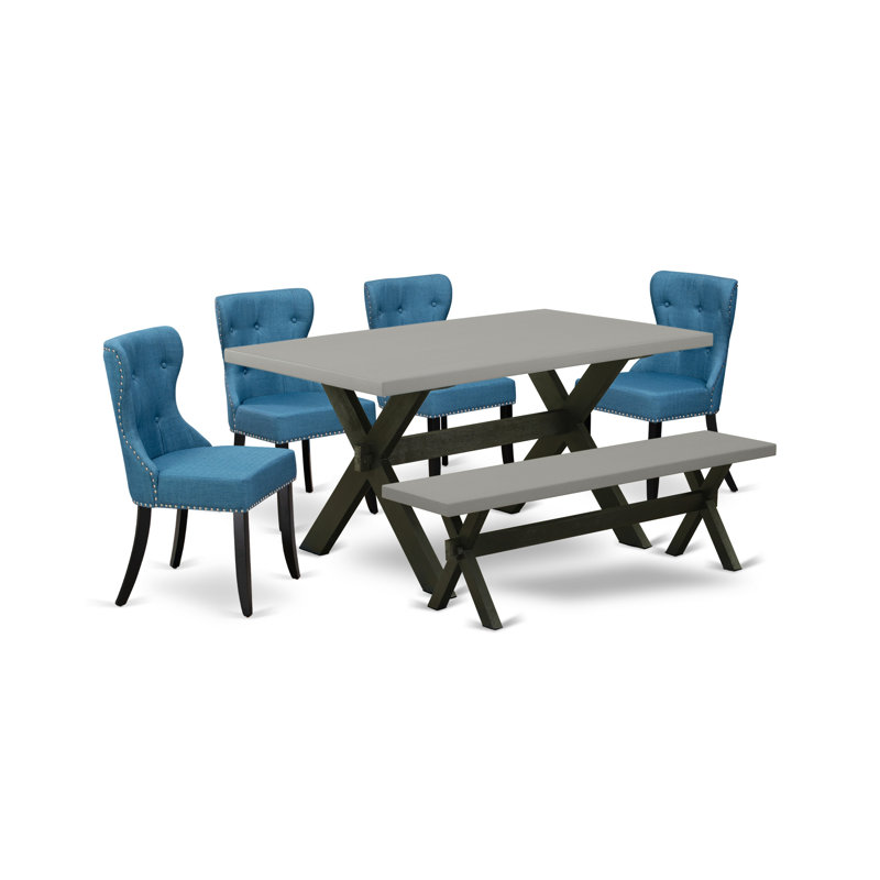 L'ensemble de table de cuisine 6 pièces comprend une table de salle à manger rectangulaire avec des pieds en X et 4 chaises Parson en tissu bleu avec banc, noir brossé