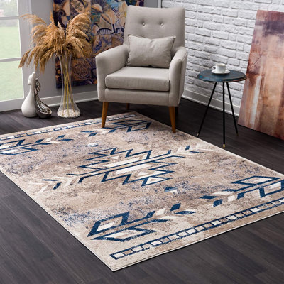 Aubreauna Area Rug in Beige