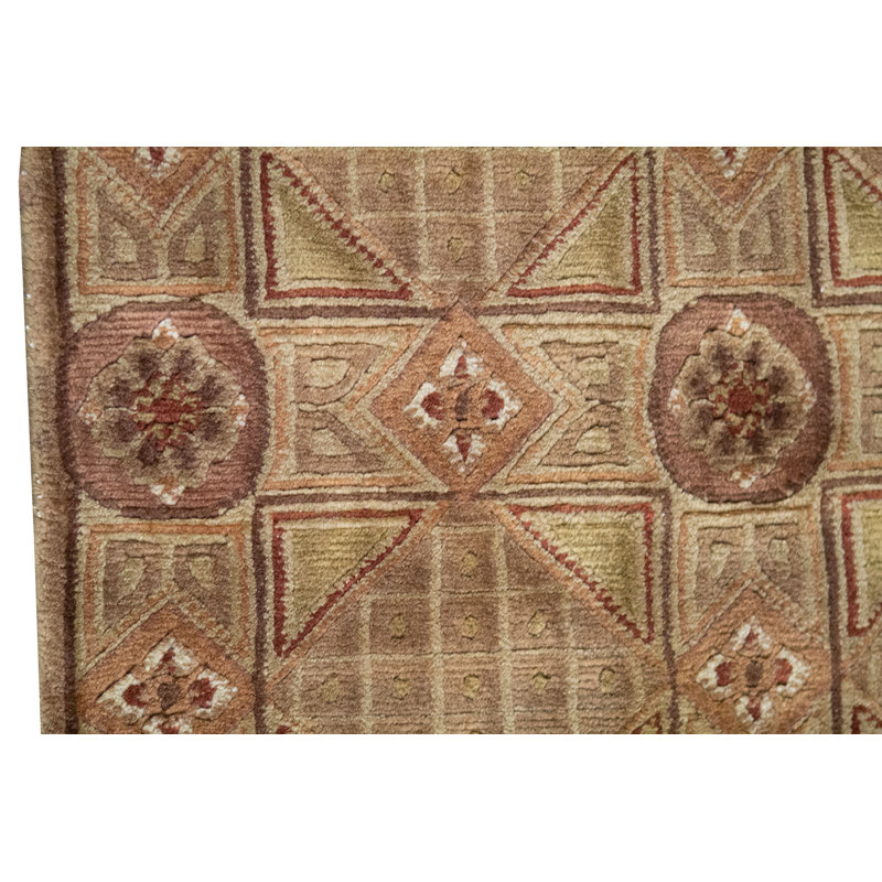 Tapis doré de haute qualité noué à la main
