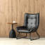 Fauteuil à oreilles Mid-Century moderne en similicuir noir avec pieds en métal