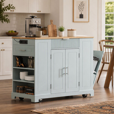 Fluted Kitchen Island with Trash Can Storage Cabinet, Power Outlet, Internal Storage Rack, Rolling on 5 Wheels, 3 Drawers, 3 Open Side Racks for 10 Ga
