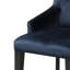 Fauteuil capitonné à dossier