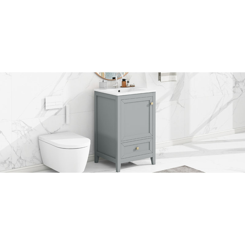 Meuble-lavabo gris de 20 po avec lavabo en céramique. Porte d'armoire et tiroir modernes. Teinture-. Lavabo à assembler requis, 20 po, gris. Rangement robuste. Et en céramique. Surface facile à nettoyer.