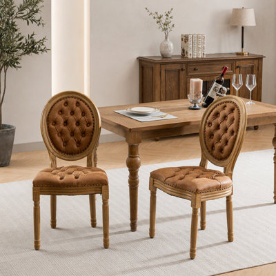 Ensemble de 2 chaises de salle à manger en similicuir de style français avec pieds en bois, décoration de boucle tirée à la main et garniture cloutée, orange