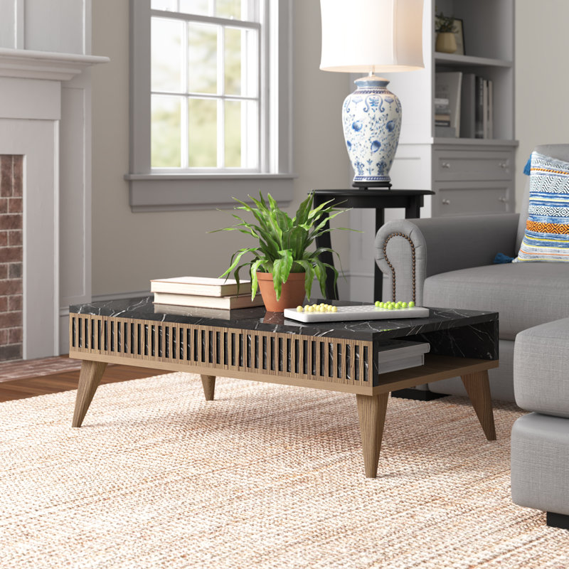 Tusten Four Leg Coffee Table with Storage