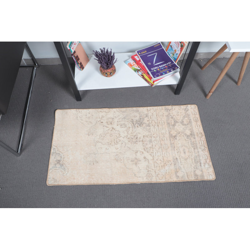 Small Beige Turkish Rug With Floral Design Perfect For Brightening Up Any Room