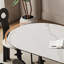 Table de salle à manger blanche et noire en pierre frittée ovale et en acier au carbone-1584689456